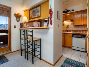 Kuchyň nebo kuchyňský kout v ubytování Cielo Grande 305