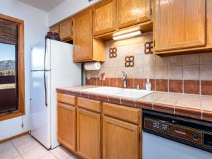 Kuchyň nebo kuchyňský kout v ubytování Cielo Grande 305