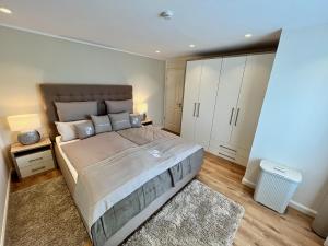 Postel nebo postele na pokoji v ubytování Haus-Holiday Walkenried - Harz