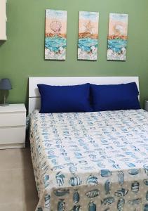 Postel nebo postele na pokoji v ubytování Casa Mare Blu Agropoli - Blumarine