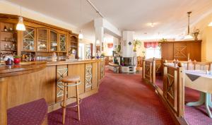Kuchyň nebo kuchyňský kout v ubytování Hotel am Wariner See