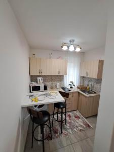 Η κουζίνα ή μικρή κουζίνα στο Dovali apartment