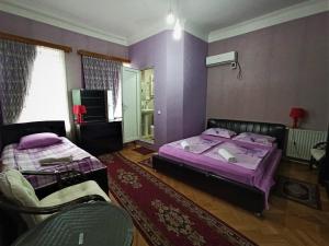 Katil atau katil-katil dalam bilik di GuestHouse LILIA &Wine Celler