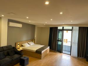 Voodi või voodid majutusasutuse Friendly Hotel toas