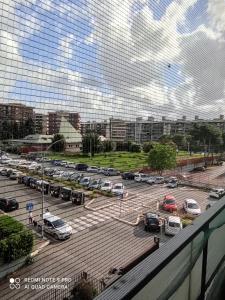 a view of a parking lot with cars parked at Da FELICIA & Fabrizio in Rome