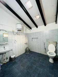 ห้องน้ำของ Coorg Daffodil Guesthouse