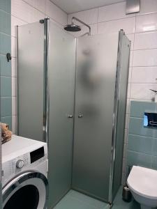 Ванная комната в Rotušės apartamentai Kretingoje