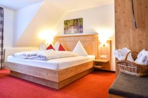 Postel nebo postele na pokoji v ubytování Burg Hotel Feldberg