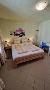 a bedroom with a large bed in a room at APARTMA JURICICH in Portorož +47 photos