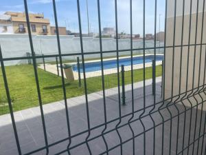 Swimmingpoolen hos eller tæt på Piso coqueto Chiclana