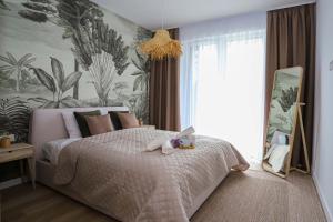 Posteľ alebo postele v izbe v ubytovaní Platán Beach Apartman with lakeview