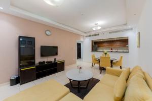 TV a/nebo společenská místnost v ubytování City Stay Prime Hotel Apartments - Al Barsha