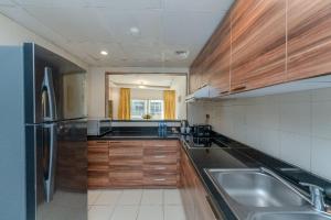 Kuchyň nebo kuchyňský kout v ubytování City Stay Prime Hotel Apartments - Al Barsha