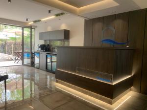 a kitchen with a counter top in a house at Park and pool studios in Nesebar