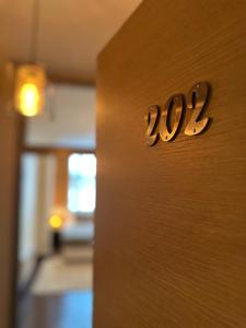 Uma cama ou camas num quarto em Hotel Alexandar Lux