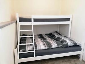 Postel nebo postele na pokoji v ubytování Apartmány Pod Čápy, Nasavrky