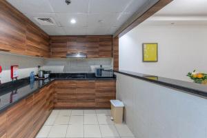 Kuchyň nebo kuchyňský kout v ubytování City Stay Prime Hotel Apartments - Al Barsha