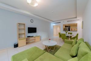 TV a/nebo společenská místnost v ubytování City Stay Prime Hotel Apartments - Al Barsha