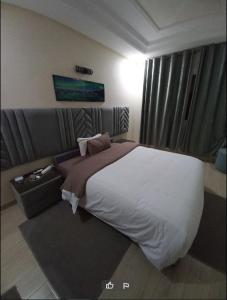 Cama o camas de una habitación en Hotel Jnan Arfoud