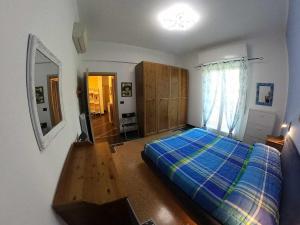 A bed or beds in a room at Apartment Gentile a 200 metri dal mare