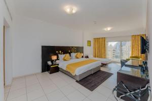 Postel nebo postele na pokoji v ubytování City Stay Prime Hotel Apartments - Al Barsha