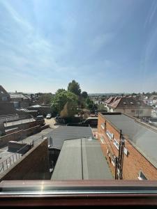 a view of a city from the top of a building at Unique Modern, 1 Bed Flat, 15 Mins To Central London in Hendon
