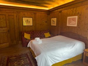 מיטה או מיטות בחדר ב-Nogherazza - La Locanda