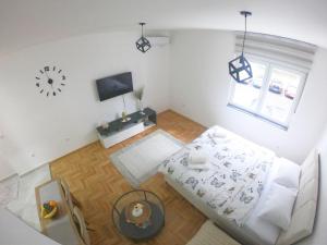 Ένα ή περισσότερα κρεβάτια σε δωμάτιο στο Apartman Lana