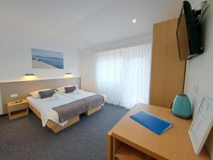 TV a/nebo společenská místnost v ubytování Rooms Zvonimir