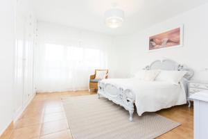 Posteľ alebo postele v izbe v ubytovaní Apartamento Río Maior