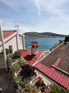 a view of the water from the roof of a house at Holiday home Penić in Rogoznica