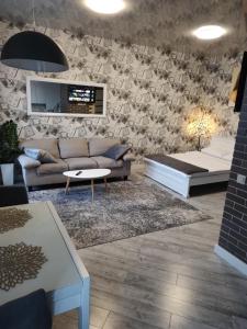 Posedenie v ubytovaní Просторі LUX апартаменти на центральному проспекті, великий Smart TV,преміум-підписки YouTube та онлайн-кінотеатрів , кавомашина, відкритий балкон, ЗВІТНІ ДОКУМЕНТИ