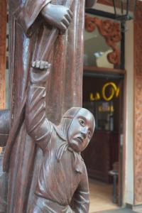 a bronze statue of a man holding a bat at Hotel La Mision in San Ignacio de Velasco