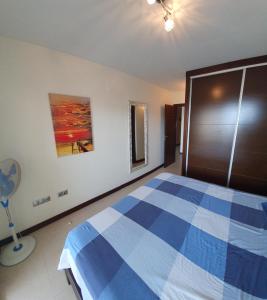 Postel nebo postele na pokoji v ubytování Urlaub am Playa Paraiso