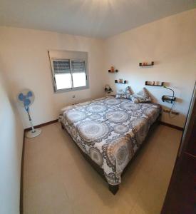 Postel nebo postele na pokoji v ubytování Urlaub am Playa Paraiso