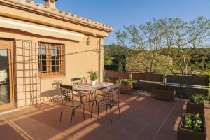 Ein Balkon oder eine Terrasse in der Unterkunft Masía Rural Can Poch