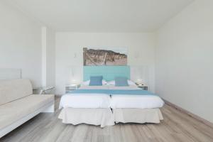 Postel nebo postele na pokoji v ubytování O7 Nordeste Playa