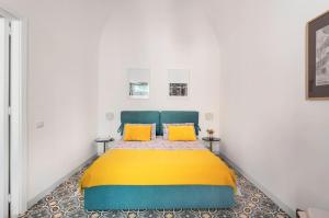 A bed or beds in a room at Casa Calderai art and design