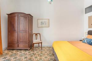 A bed or beds in a room at Casa Calderai art and design