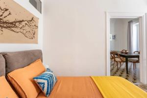 A bed or beds in a room at Casa Calderai art and design