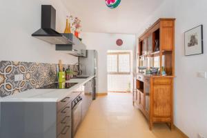 A kitchen or kitchenette at Casa Calderai art and design