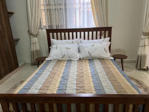 Una cama o camas en una habitación de Ahva I Residence