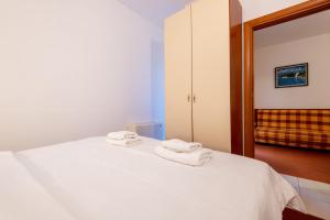 Postel nebo postele na pokoji v ubytování Hotel Posejdon