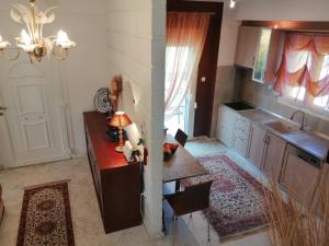 A kitchen or kitchenette at Prime Luxury Villa beach front