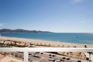 a view of the beach from the balcony of a condo at Piso Sofia in Empuriabrava