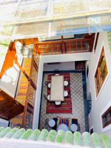 an overhead view of a dining room with a table at RIAD GALIYA in Marrakech