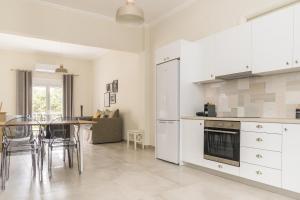 Kuchyň nebo kuchyňský kout v ubytování Sissy apartment