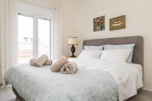 Postel nebo postele na pokoji v ubytování Sissy apartment