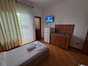 Postel nebo postele na pokoji v ubytování Guest House "Pisha"