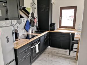 Kuchyňa alebo kuchynka v ubytovaní Apartament Na Kamieniaku
